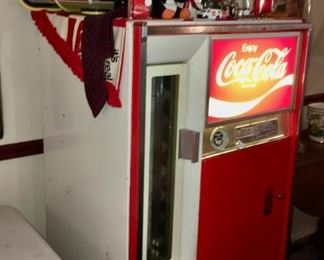 Vintage Coca-Cola bottle machine by The Vendo Co., Kansas City, MO. Model No. H63B. Serial No. 204035300. Built between 1952-1966.