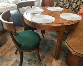 Round kitchen table. 4 upholstered-seat chairs.