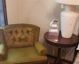 Olive green club chair, side table, lamp