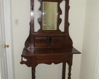 VICTORIAN HALL TREE WITH BEVELED MIRROR.