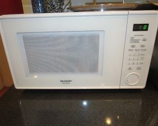 BRAND NEW MICROWAVE JUST OUT OF THE BOX.
