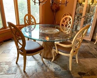 Beautiful Henredon round glass top table, with distinguished pedestal, and 6 chairs