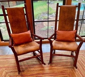 Pair of Lovely Old Hickory Leather High Back Rocking Chairs. These lovely leather high back rockers by Old Hickory. These fantastic rocking chairs each measure 47x25.5x39 inches.