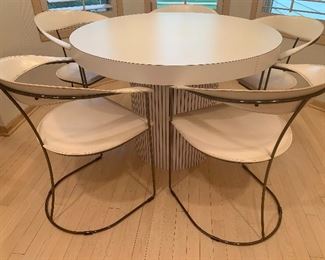 Five Vintage Arrben Chairs and Contemporary Table. What a great vintage table and chairs! The chairs, by Arrben are stamped on the bottom and made in Italy. The chairs have some wear/scratches/scrapes on the arms. The chairs each are 30" h and the seats measure 16" x 19". 