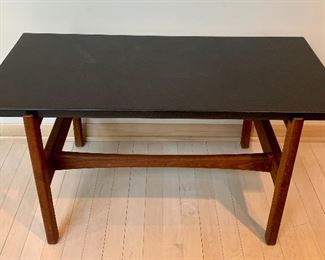 Jens Rison Design Mid Century Table. Features a walnut base and slate top. Circa 1960's 

Measures 36" x 17" x 18" In very good condition with overall light wear. 