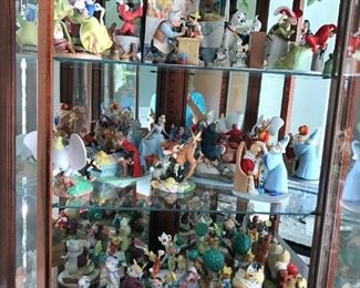 #37	The Disney collection "Disney's Magic Memories designed by Walt Disney Artists set of 17 statues  (1)Peter Pan 8302 of 15,000;(2)Lady and the tramp 7008 of 15000;(3)Aristocats 6647 of 15,000;(4)Cinderella 9941 of 15000;(5)Bambi 10603 of 15000;(6) sleeping beauty 6533 of 15000;(7)Alice in wonderland 8914 of 15000;(8)Snow White 14564 of 15000; (9)Rescuers 6291 of 15000;(10)the sword and the stone 7127; (11) Jungle Book 40120; (12)Pinocchio 8913; (13)Fantasia 11,638; (14)101 Dalmatians 6034; (15)Fox and the hound 1941; (16)Robin hood 3628 ;(17)Dumbo 11076	 $1,500.00 	
