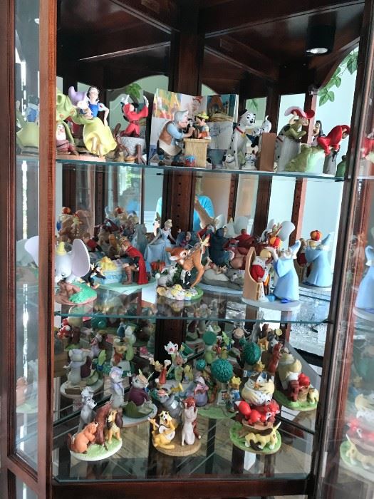 #37	The Disney collection "Disney's Magic Memories designed by Walt Disney Artists set of 17 statues  (1)Peter Pan 8302 of 15,000;(2)Lady and the tramp 7008 of 15000;(3)Aristocats 6647 of 15,000;(4)Cinderella 9941 of 15000;(5)Bambi 10603 of 15000;(6) sleeping beauty 6533 of 15000;(7)Alice in wonderland 8914 of 15000;(8)Snow White 14564 of 15000; (9)Rescuers 6291 of 15000;(10)the sword and the stone 7127; (11) Jungle Book 40120; (12)Pinocchio 8913; (13)Fantasia 11,638; (14)101 Dalmatians 6034; (15)Fox and the hound 1941; (16)Robin hood 3628 ;(17)Dumbo 11076	 $1,500.00 	
