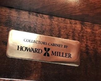 #38	Howard Miller corner display cabinet with 4 glass shelves, etch glass doors 24x32x84	 $1,000.00 	
