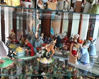 #37	The Disney collection "Disney's Magic Memories designed by Walt Disney Artists set of 17 statues  (1)Peter Pan 8302 of 15,000;(2)Lady and the tramp 7008 of 15000;(3)Aristocats 6647 of 15,000;(4)Cinderella 9941 of 15000;(5)Bambi 10603 of 15000;(6) sleeping beauty 6533 of 15000;(7)Alice in wonderland 8914 of 15000;(8)Snow White 14564 of 15000; (9)Rescuers 6291 of 15000;(10)the sword and the stone 7127; (11) Jungle Book 40120; (12)Pinocchio 8913; (13)Fantasia 11,638; (14)101 Dalmatians 6034; (15)Fox and the hound 1941; (16)Robin hood 3628 ;(17)Dumbo 11076	 $1,500.00 	
