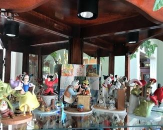 #37	The Disney collection "Disney's Magic Memories designed by Walt Disney Artists set of 17 statues  (1)Peter Pan 8302 of 15,000;(2)Lady and the tramp 7008 of 15000;(3)Aristocats 6647 of 15,000;(4)Cinderella 9941 of 15000;(5)Bambi 10603 of 15000;(6) sleeping beauty 6533 of 15000;(7)Alice in wonderland 8914 of 15000;(8)Snow White 14564 of 15000; (9)Rescuers 6291 of 15000;(10)the sword and the stone 7127; (11) Jungle Book 40120; (12)Pinocchio 8913; (13)Fantasia 11,638; (14)101 Dalmatians 6034; (15)Fox and the hound 1941; (16)Robin hood 3628 ;(17)Dumbo 11076	 $1,500.00 	
