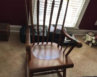 #70	wood rocking chair with as is rocker that has been repaired but works 	 $60.00 	
