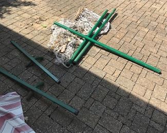 #89	Hamick stand green metal with rope hamick 	 $75.00 	
