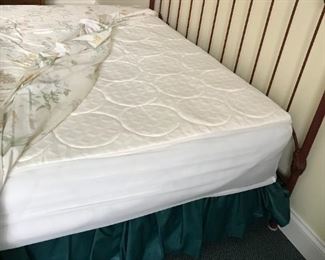 #124	cast iron and brass full size bed that was painted burgundy with full size mattress 	 $175.00 	
