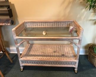 #147	Henry Link pickel white wicker tea cart on wheels and glass top 38x20x30	 $100.00 	
