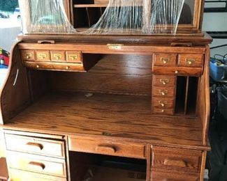 #156	winners only brand oak roll top desk in 3 pieces with hutch 2 glass doors 54x33x30-76 	 $200.00 	
