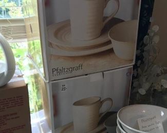 #214	Pfaltzgraff 2 set of 8 place setting in box  cream 	 $50.00 	
