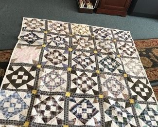 #277	full vintage scrappie quilt in black white square/cross/flower desighn	 $50.00 	
