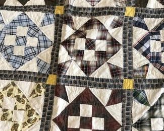 #277	full vintage scrappie quilt in black white square/cross/flower desighn	 $50.00 	
