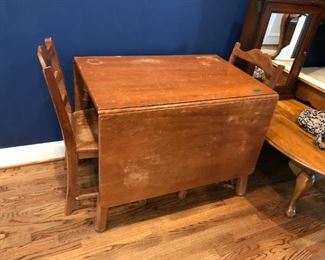 #7	maple drop side dining table with 4 chairs  as is top 24-66x38x29	 $130.00 	
