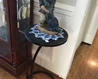 #47	round metal side table to go next to chair 15x29	 $45.00 	
#48	boy with his dog statue 15 tall 	 $30.00 	
