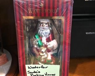 #56	Waterford Santa rocking horse ornament 	 $20.00 	
