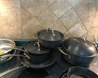 #62	8 piece cook set by Calphalon 	 $120.00 	
