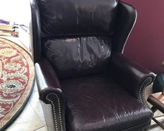 #69	Barcalounge recliner burgundy with nail heads front and wood legs as is scratch	 $200.00 	
