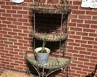 #86	metal bakers rack with curve sides 3 shelves 	 $180.00 	
