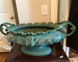 #101	green metal irn for flowers with drain on bottom 32x14x12	 $60.00 	
