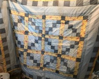 #105	store made yellow blue quilt 	 $25.00 	
