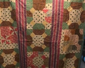 #107	68x80 green yellow pink scrappie quilt 	 $60.00 	
