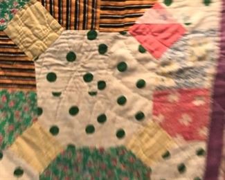 #107	68x80 green yellow pink scrappie quilt 	 $60.00 	
