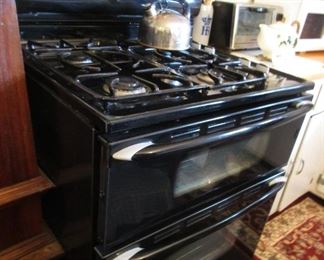 black gas stove double oven Maytag Gemini