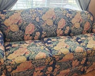 Blue Sofa with Yellow Flowers