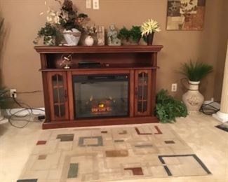 Very nice fireplace/TV cabinet in working condition 