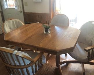 four chair solid Oak Dinette set with one leaf
