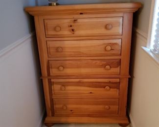 Five drawer pine wood tall chest