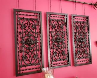 Three pieces antique iron vent covers from Byron Cade Floral, circa prior 1947, used as wall décor