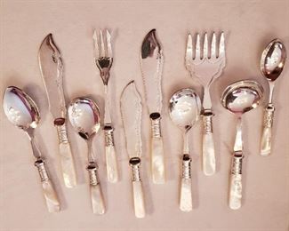 Mother of pearl and silverplate flatware