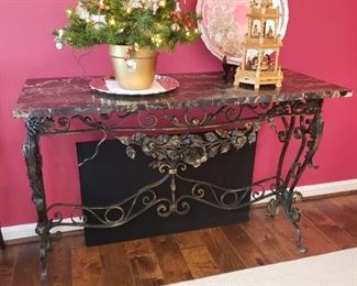 Wrought iron marble top console table, approximately 50 inches wide by 20 inches deep by 31 inches high