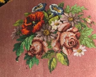 Antique oval foot rest. Hand stitched and beaded needlepoint, maple base. Circa 1915.