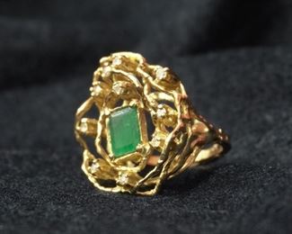 Custom emerald and gold ring