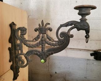 Pair of wrought iron candle holders