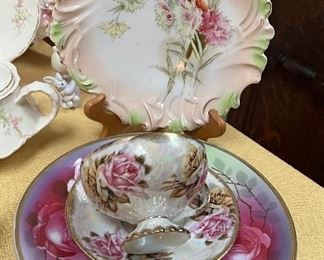 Painted plates and tea cups 