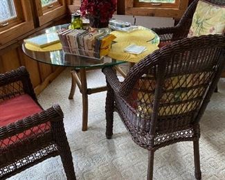 Rattan table with glass top and wicker 3 chairs