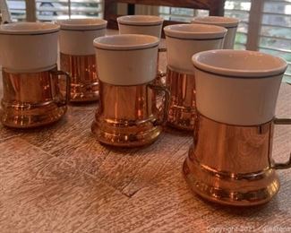 Seven teleflora Ceramic Coffee Cups with Copper Sleeves