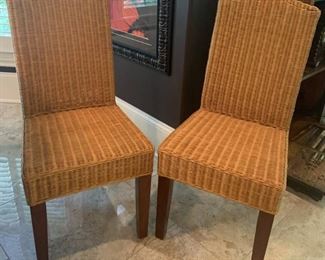 Two Sturdy Camelback Wicker Chairs with Wooden Legs