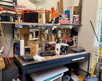Amazing workbench, metal storage shelves, vintage clocks, tools, etc