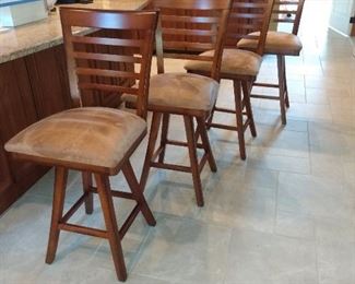 Four bar stools with backs