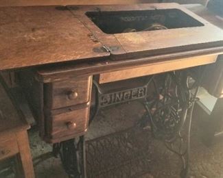 Singer sewing machine with metal table